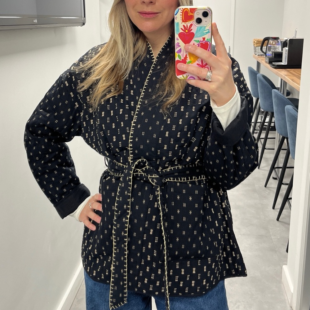 Quilted jacket with embroidered details